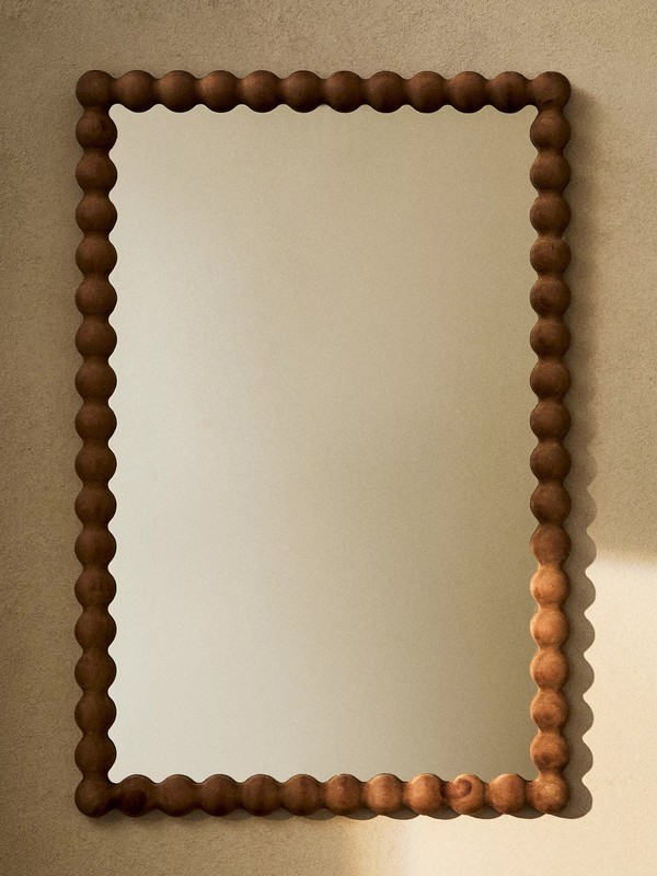 rectangular wall mirror with wooden frame