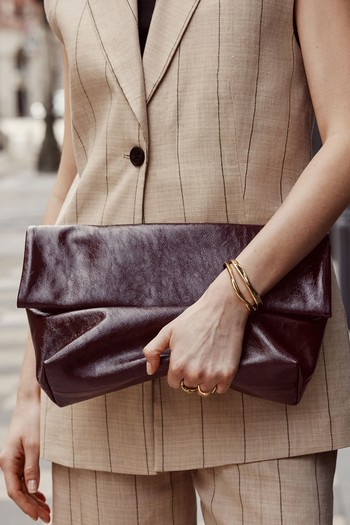 Folded Patent-Leather Clutch, AED 585 | & Other Stories