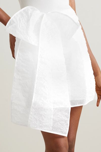 Gigi Bow-Detailed Matelassé Mini Skirt, AED 1,453 | Cecilie Bahnsen 